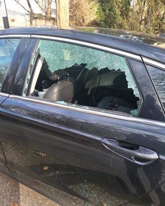 Broken car door glass, ready for restoration.