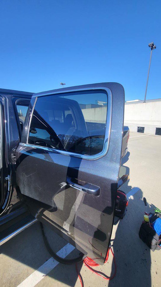 Car side door glass.